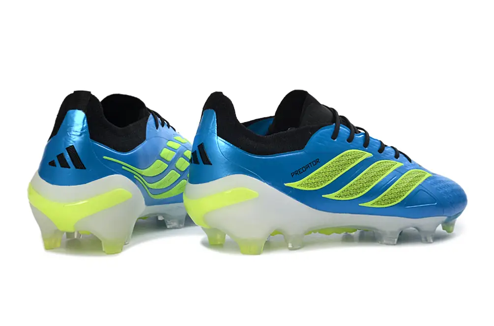 Adidas Predator 26 Elite FG football in a player's foot, demonstrating its comfortable and secure fit