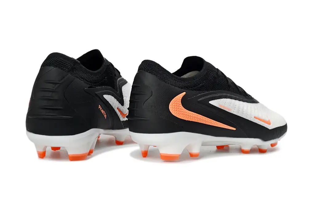 Nike Phantom 6 Elite FG football boot with player wearing it, demonstrating its performance