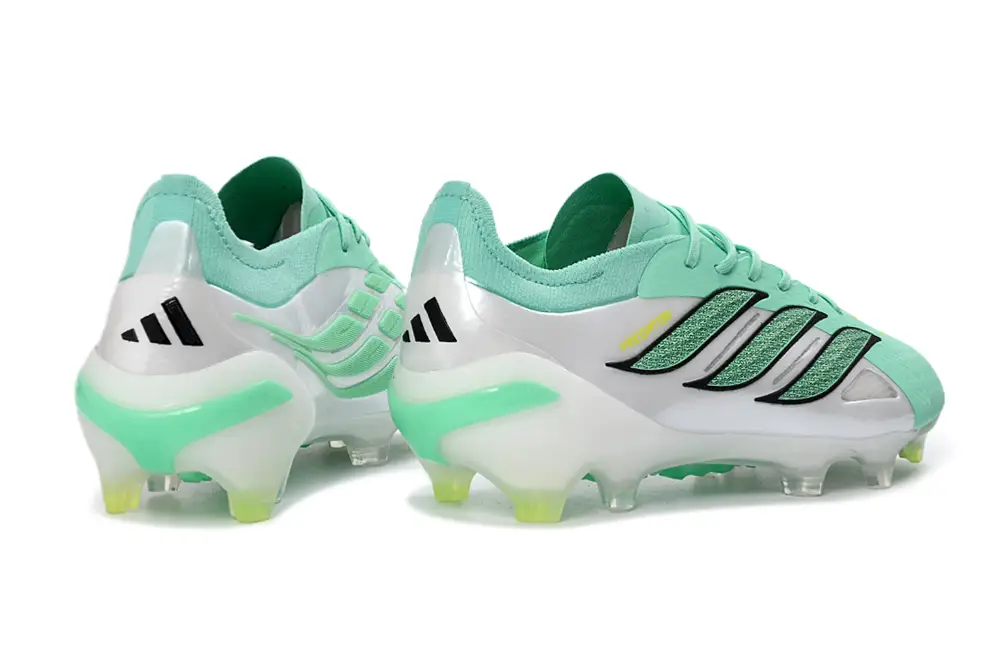 Side view of Adidas Predator 26 Elite FG football cleat highlighting its agility and speed features.
